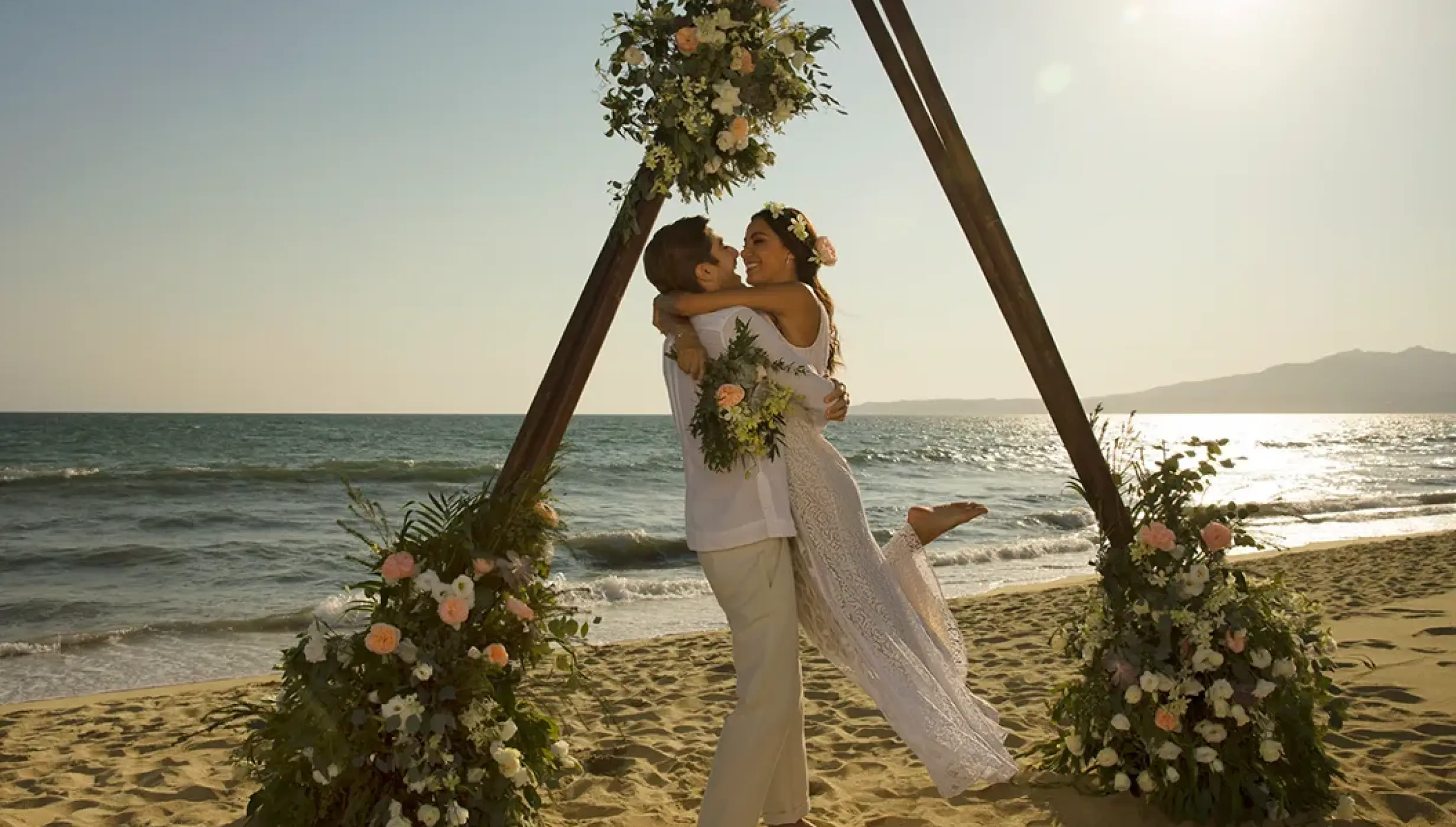 Ceremony setup on the Barracuda beach venue at Secrets Wild Orchid.