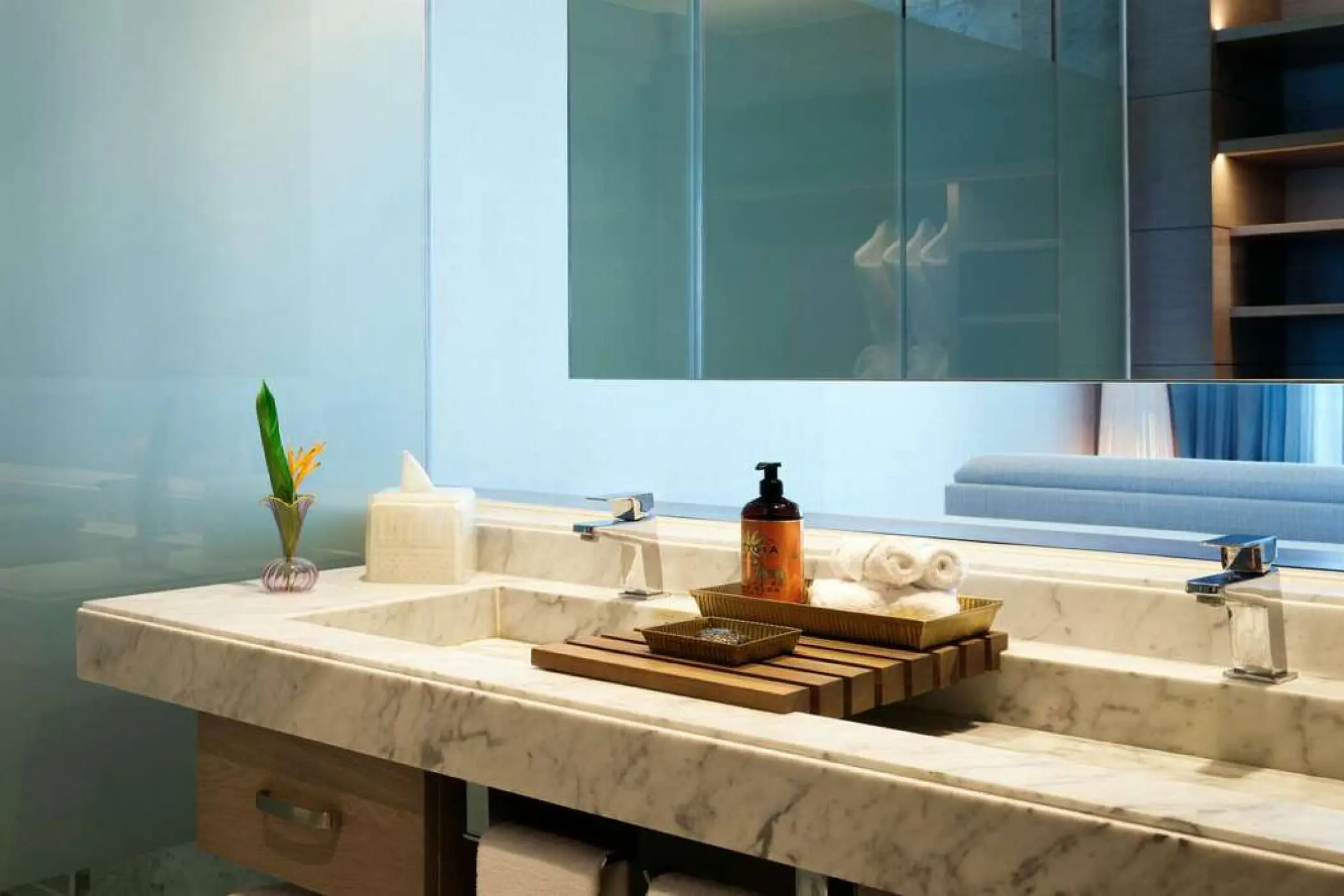 Marble double vanity with luxury toiletries at SLS Playa Mujeres, Cancun