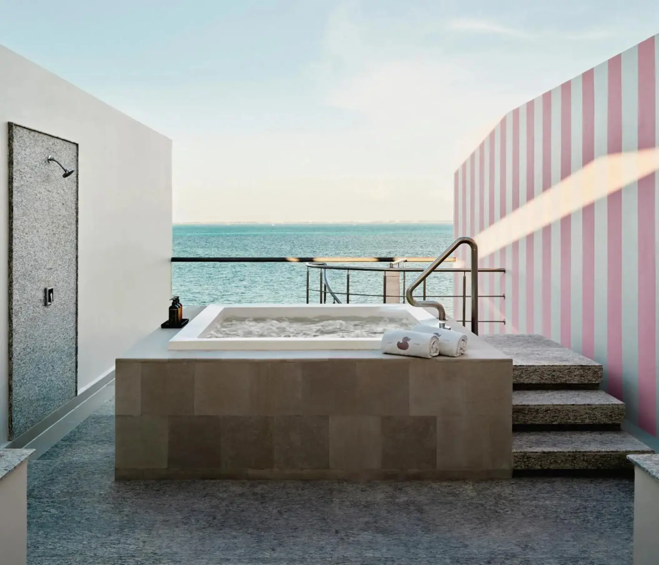 Elite Suite balcony with private hot tub and ocean view at SLS Playa Mujeres, Cancun