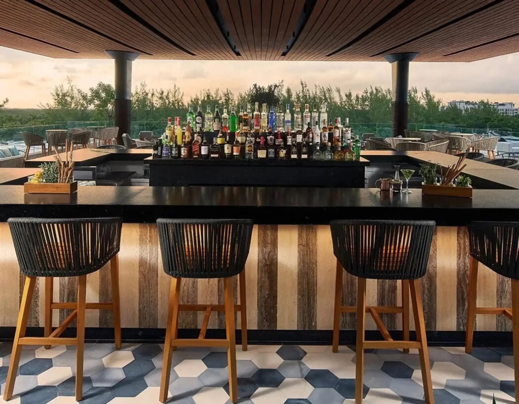 Rooftop cocktail bar at SLS Playa Mujeres overlooking the jungle, Cancun