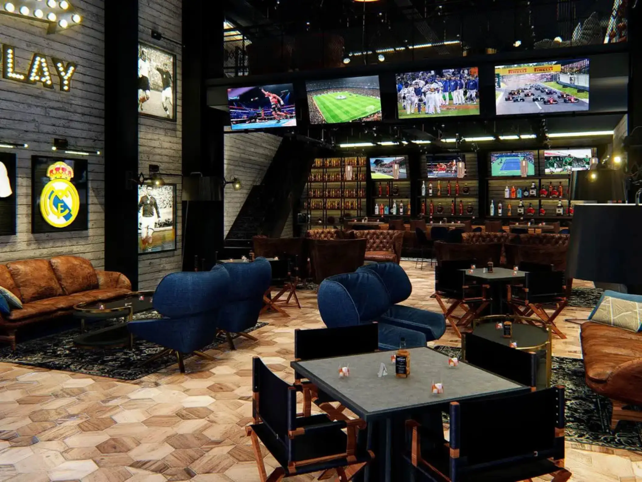 Hudson Tavern sports bar with leather seating and multiple TV screens at SLS Playa Mujeres, Cancun