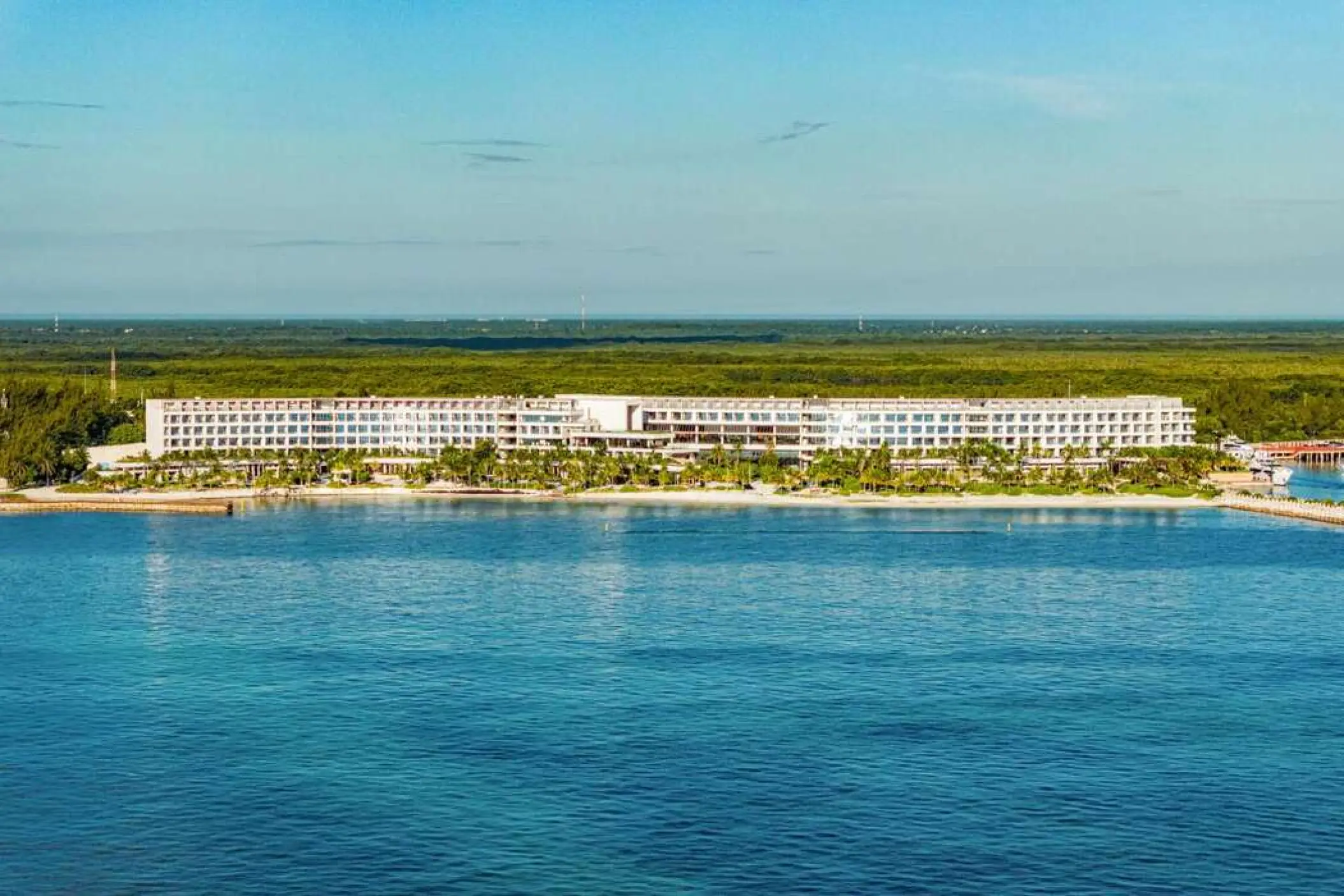 SLS Playa Mujeres exterior facade and beachfront seen from the Caribbean Sea, Cancun