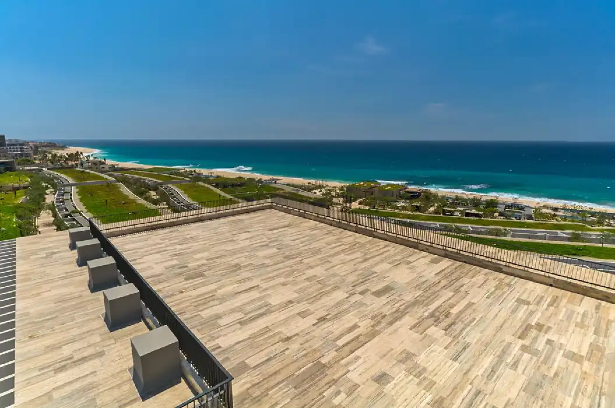 Stone terrace at Solaz Los Cabos overlooking the beach and ocean, Cabo San Lucas