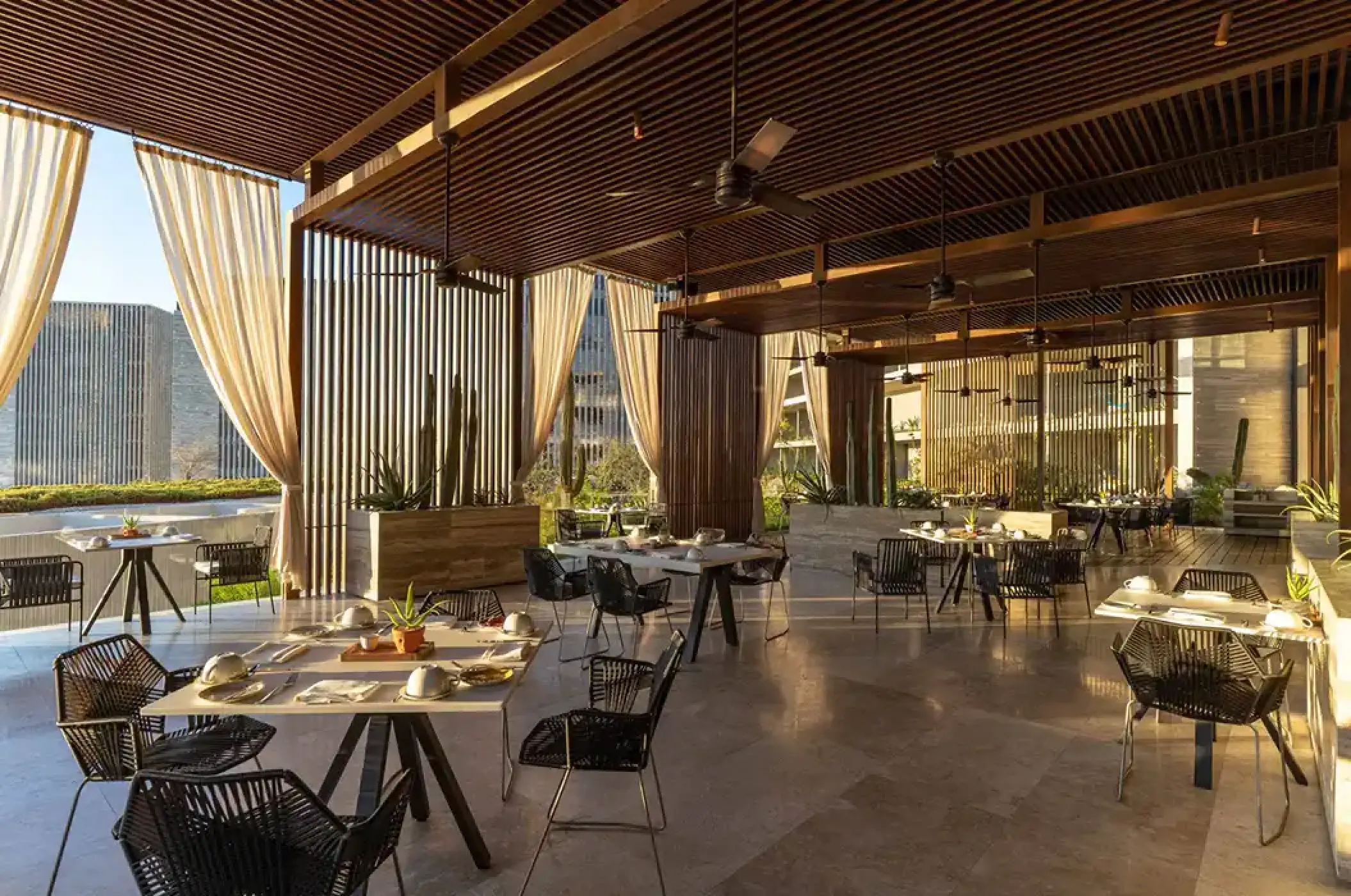 Cascabel restaurant with modern wood architecture at Solaz Los Cabos, Cabo San Lucas