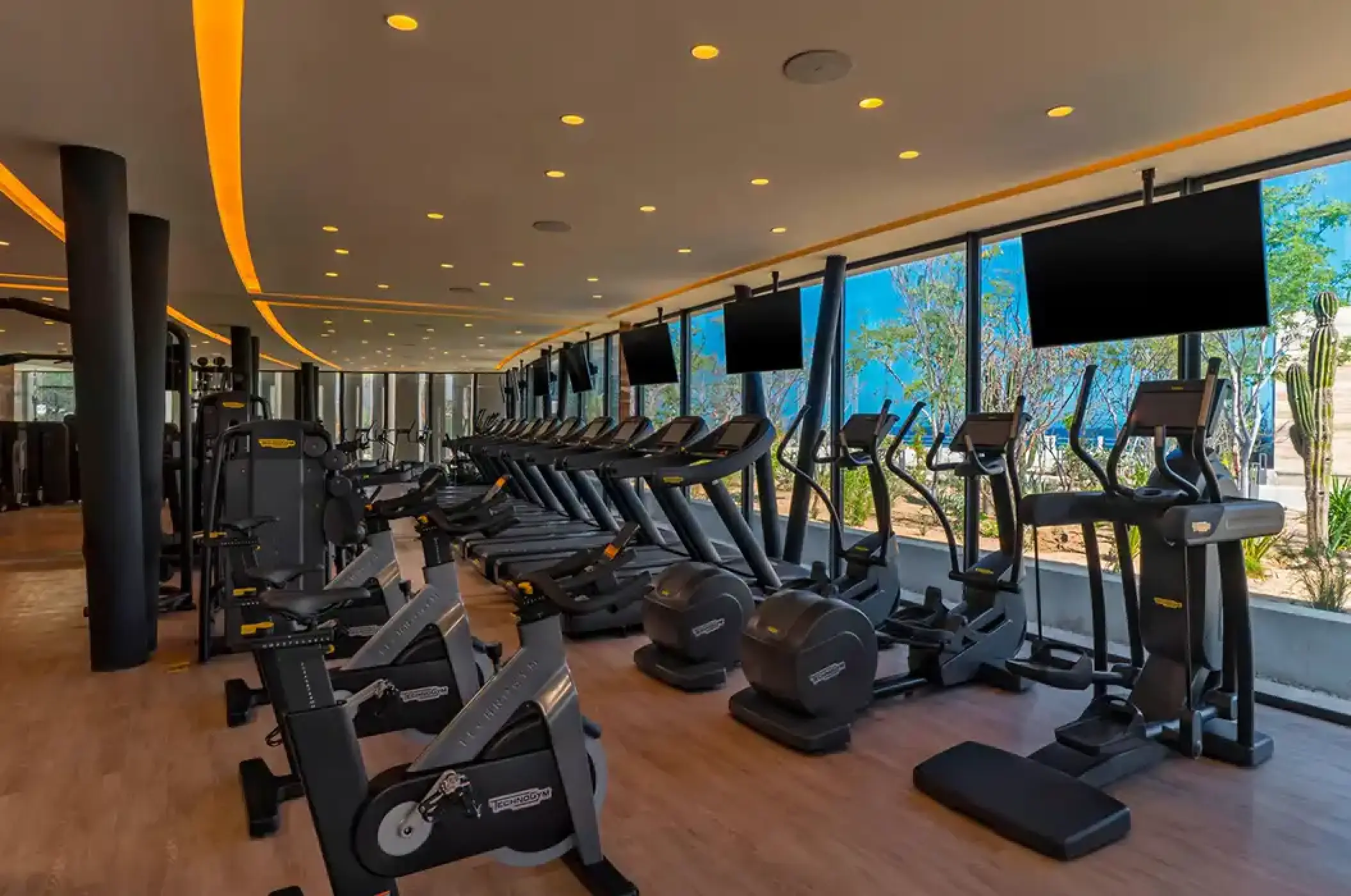 Fitness center with treadmills and stationary bikes at Solaz Los Cabos, Cabo San Lucas