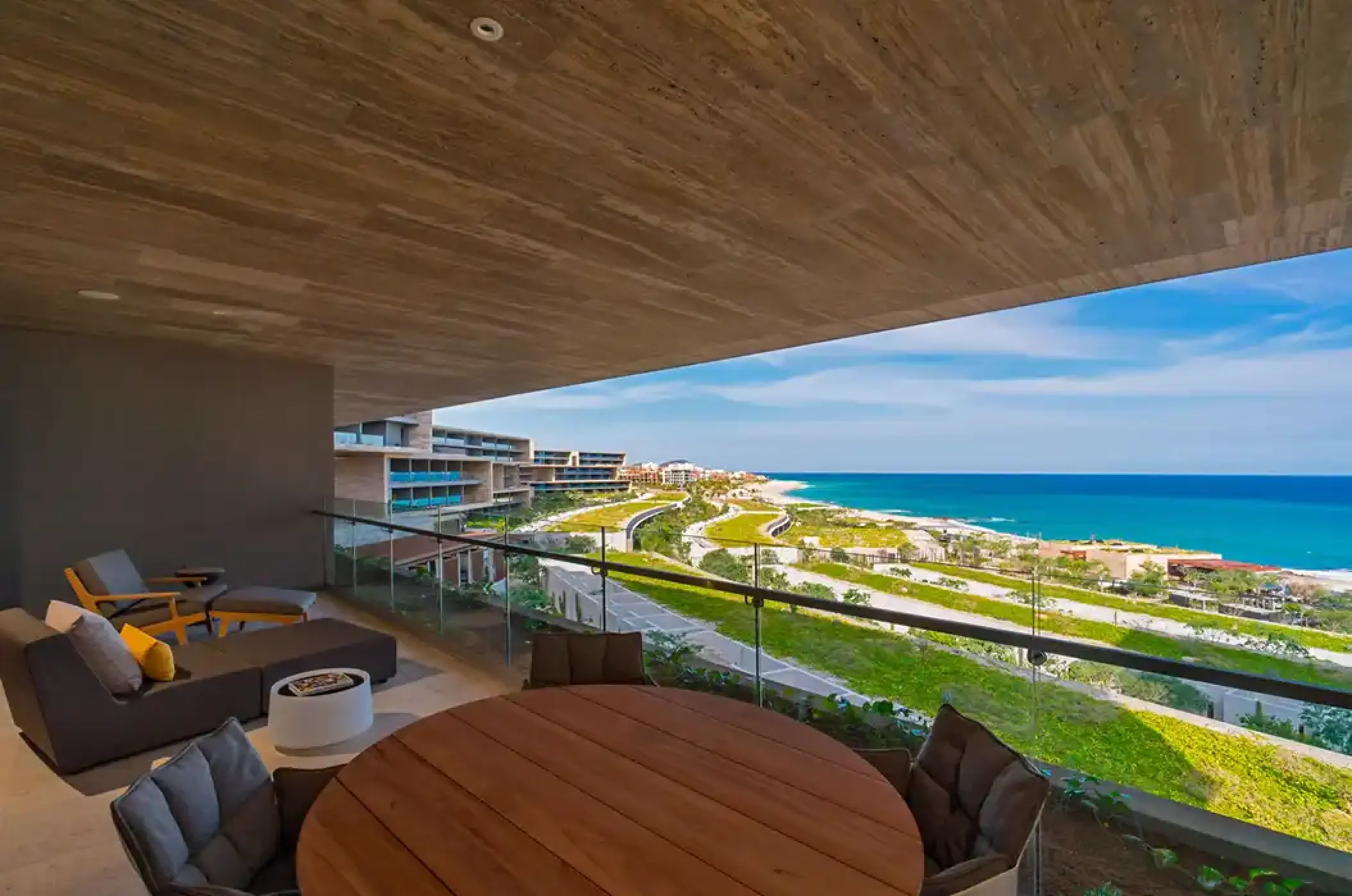 Solaz Los Cabos terrace with lounge furniture and ocean views, Cabo San Lucas