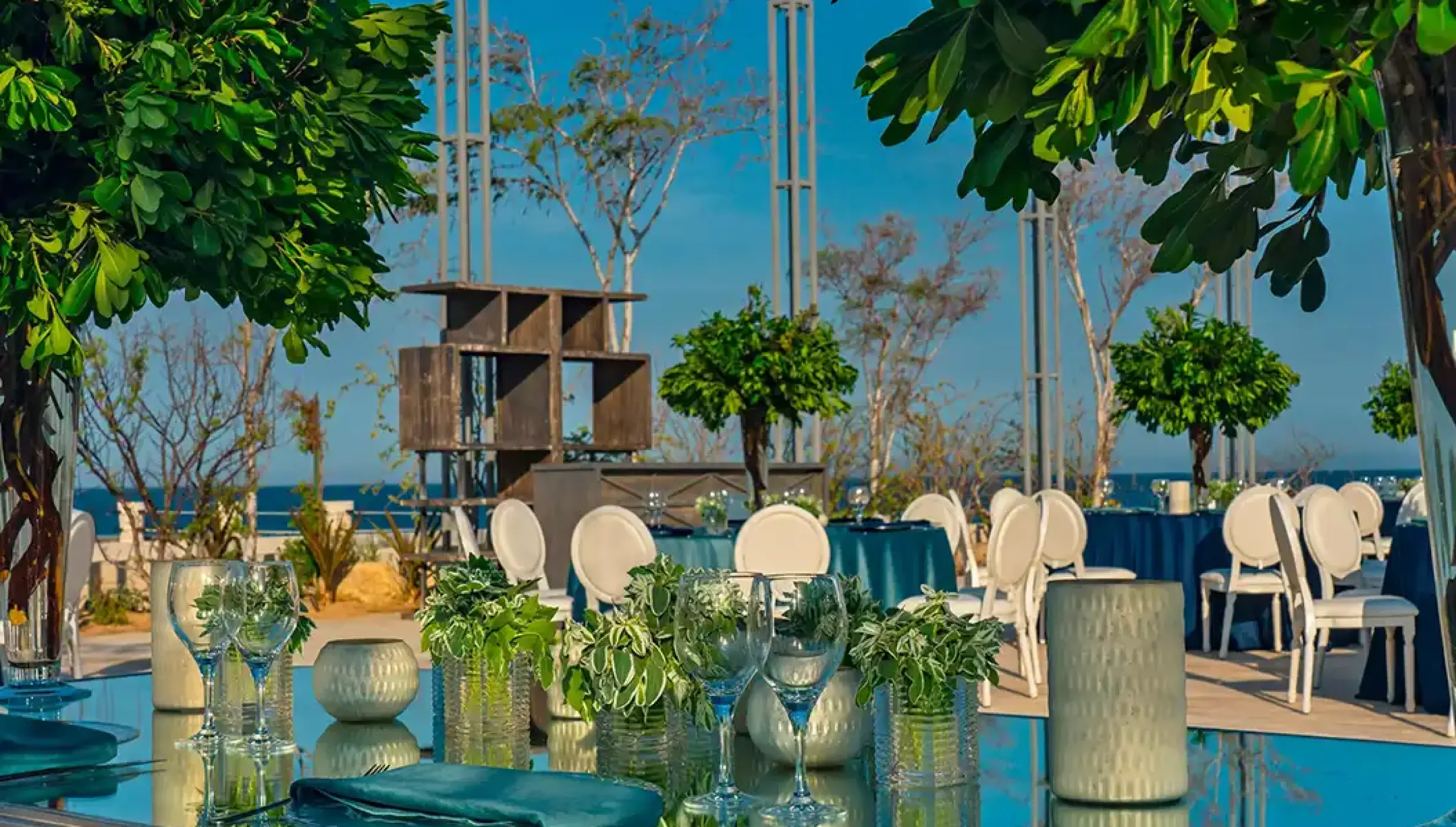 Outdoor wedding reception setup with ocean views at Solaz Los Cabos, Cabo San Lucas