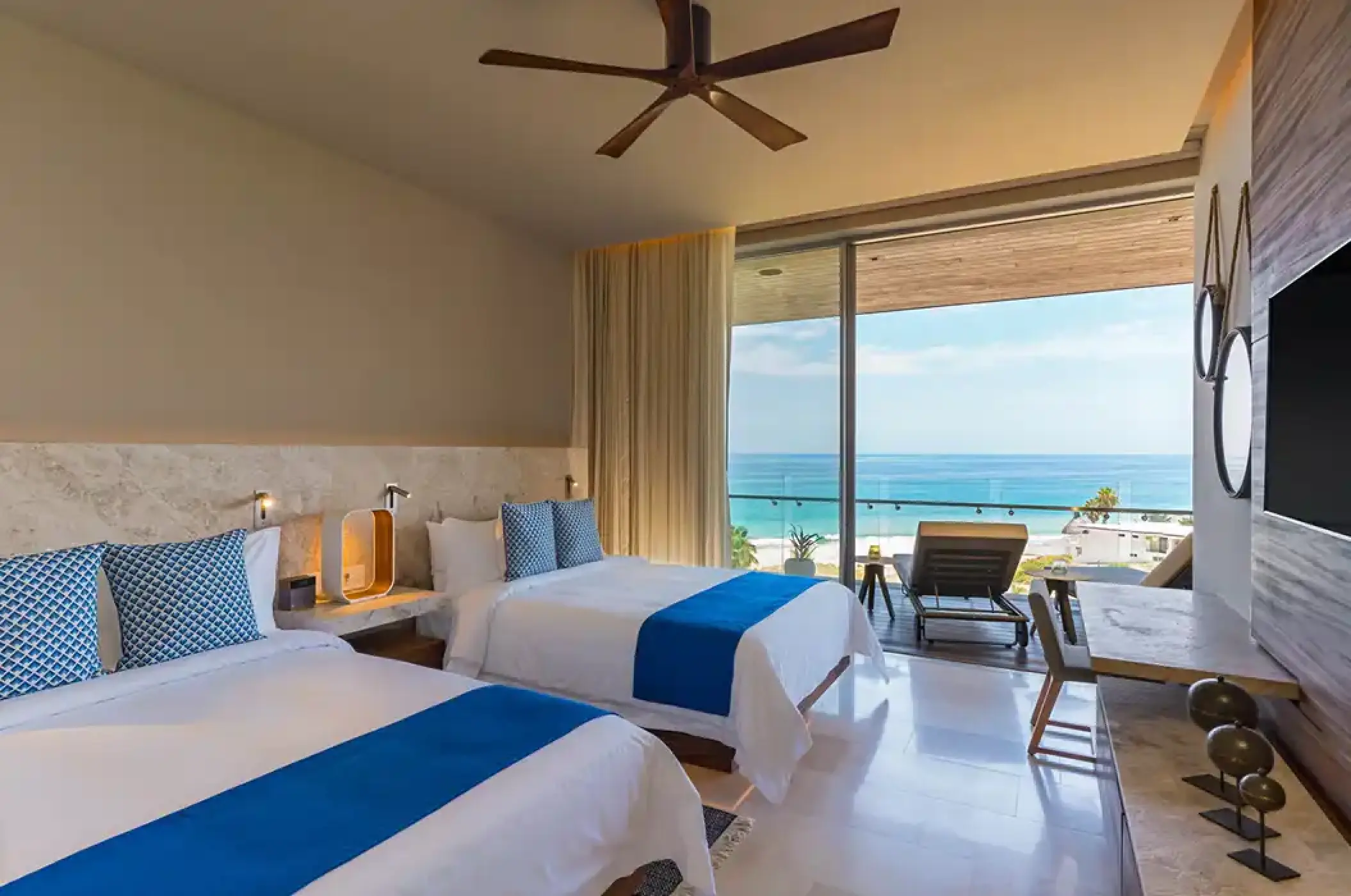 Modern double guest room with oceanfront balcony at Solaz Los Cabos, Cabo San Lucas