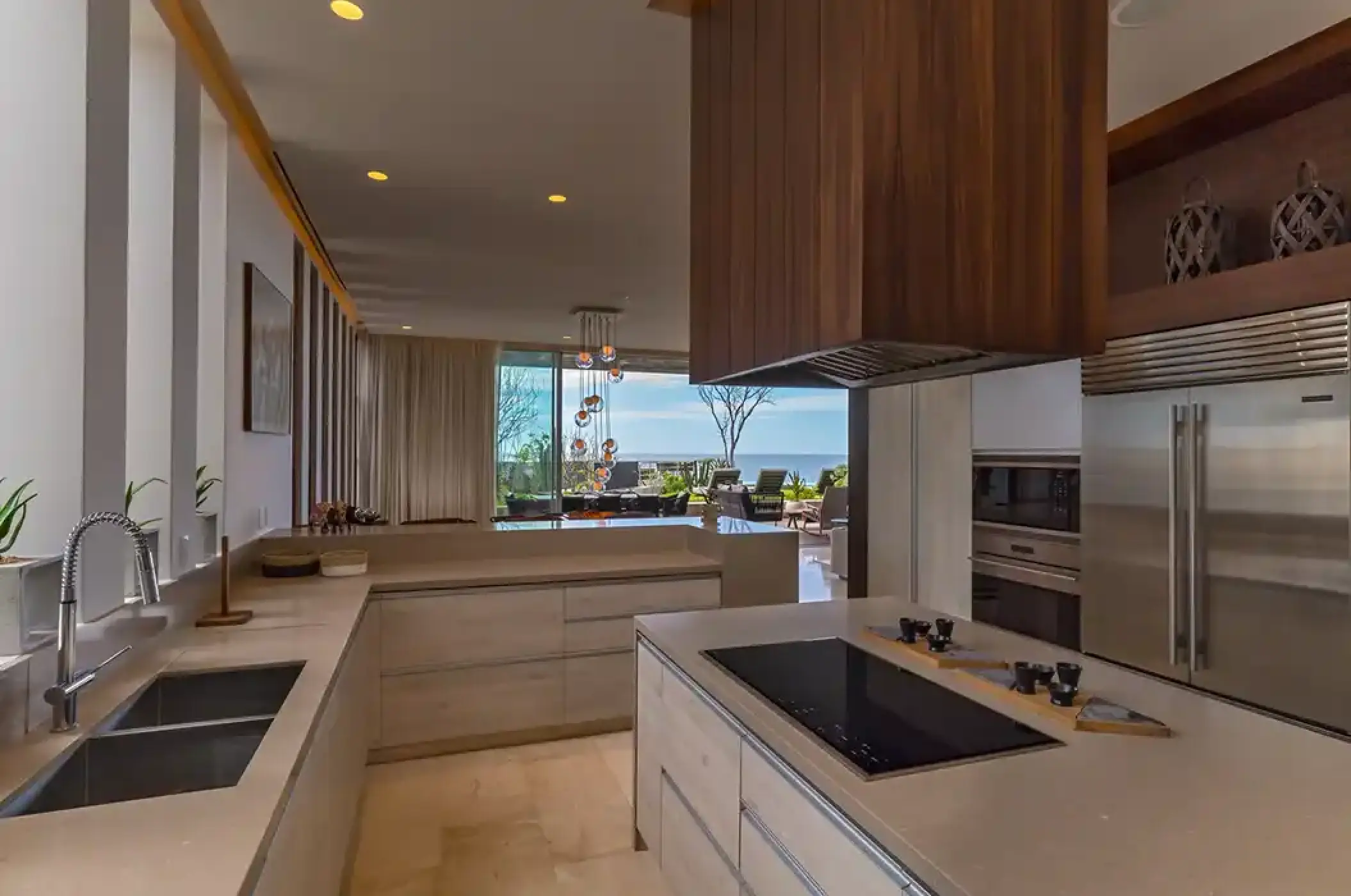 Modern residence kitchen with ocean views at Solaz Los Cabos, Cabo San Lucas