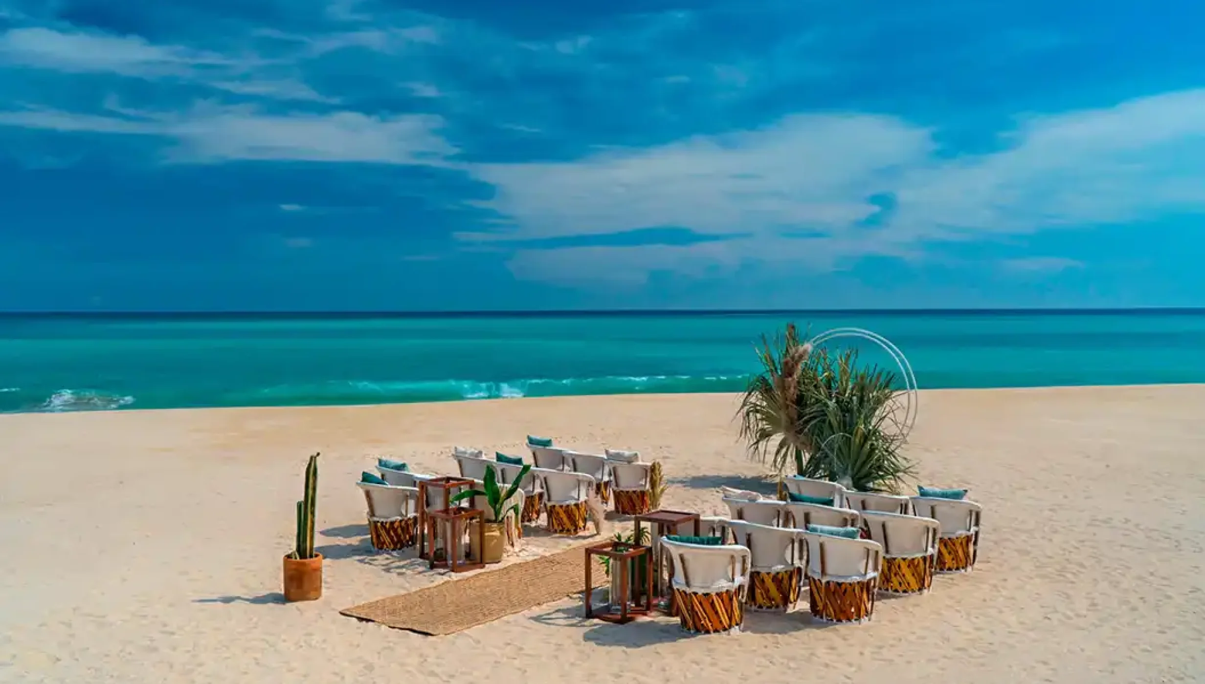 Ceremony decor on the beach at Solaz Los Cabos
