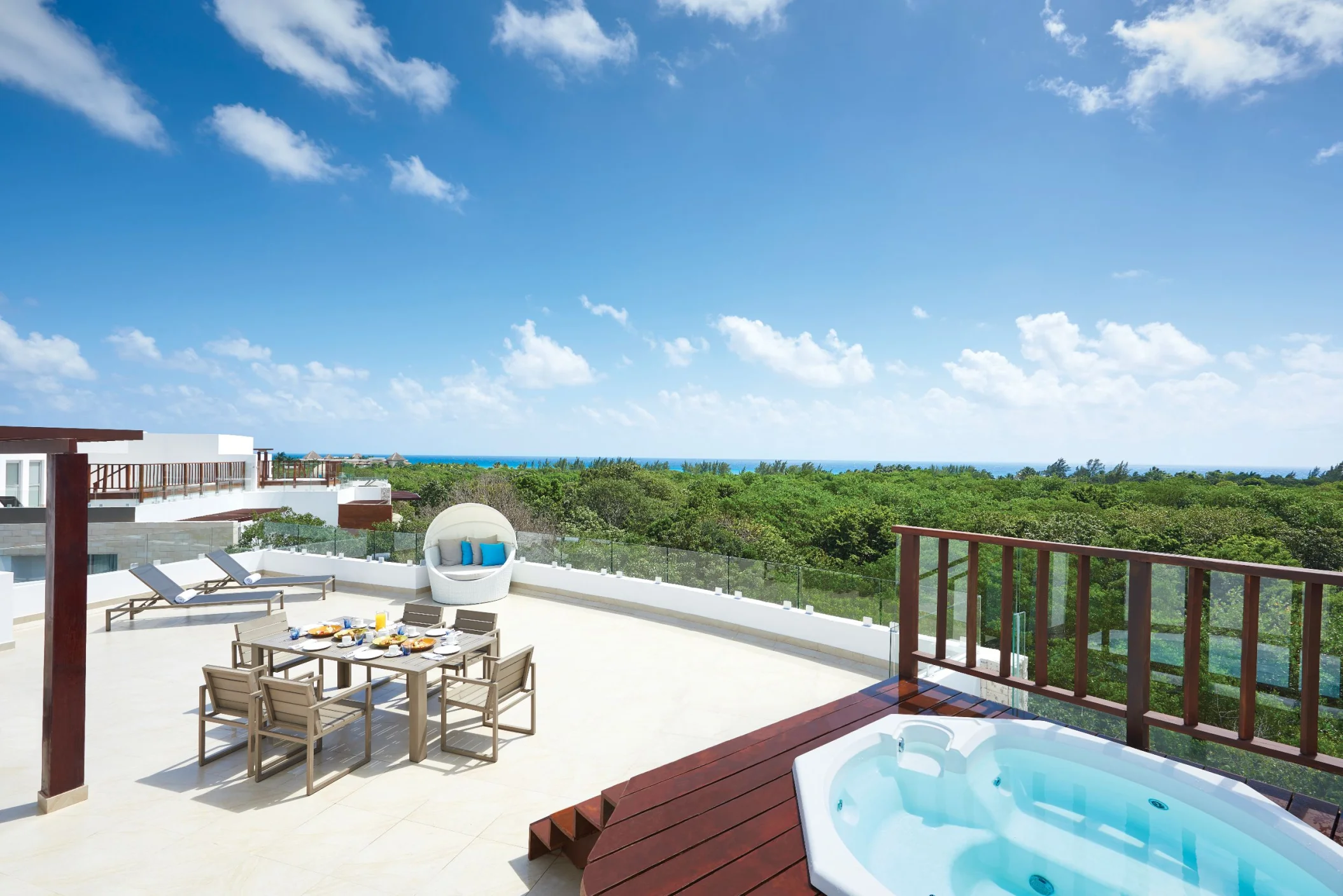 terrace of the two bedroom penthouse with private jacuzzi at The Fives Beach Hotel & Residences