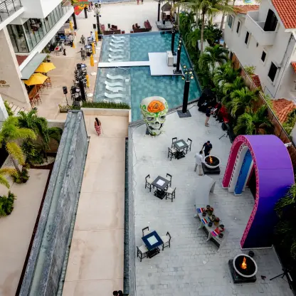 Aerial view of the lobby terrace and pool at The Fives Oceanfront, Riviera Maya