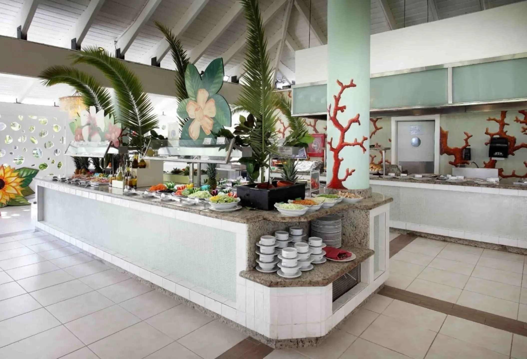 Buffet restaurant station with tropical decor at TRS Turquesa, Punta Cana