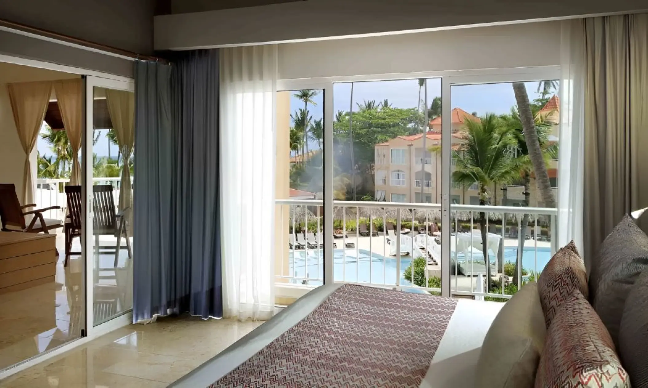Jacuzzi Terrace Suite bedroom with pool view at TRS Turquesa, Punta Cana