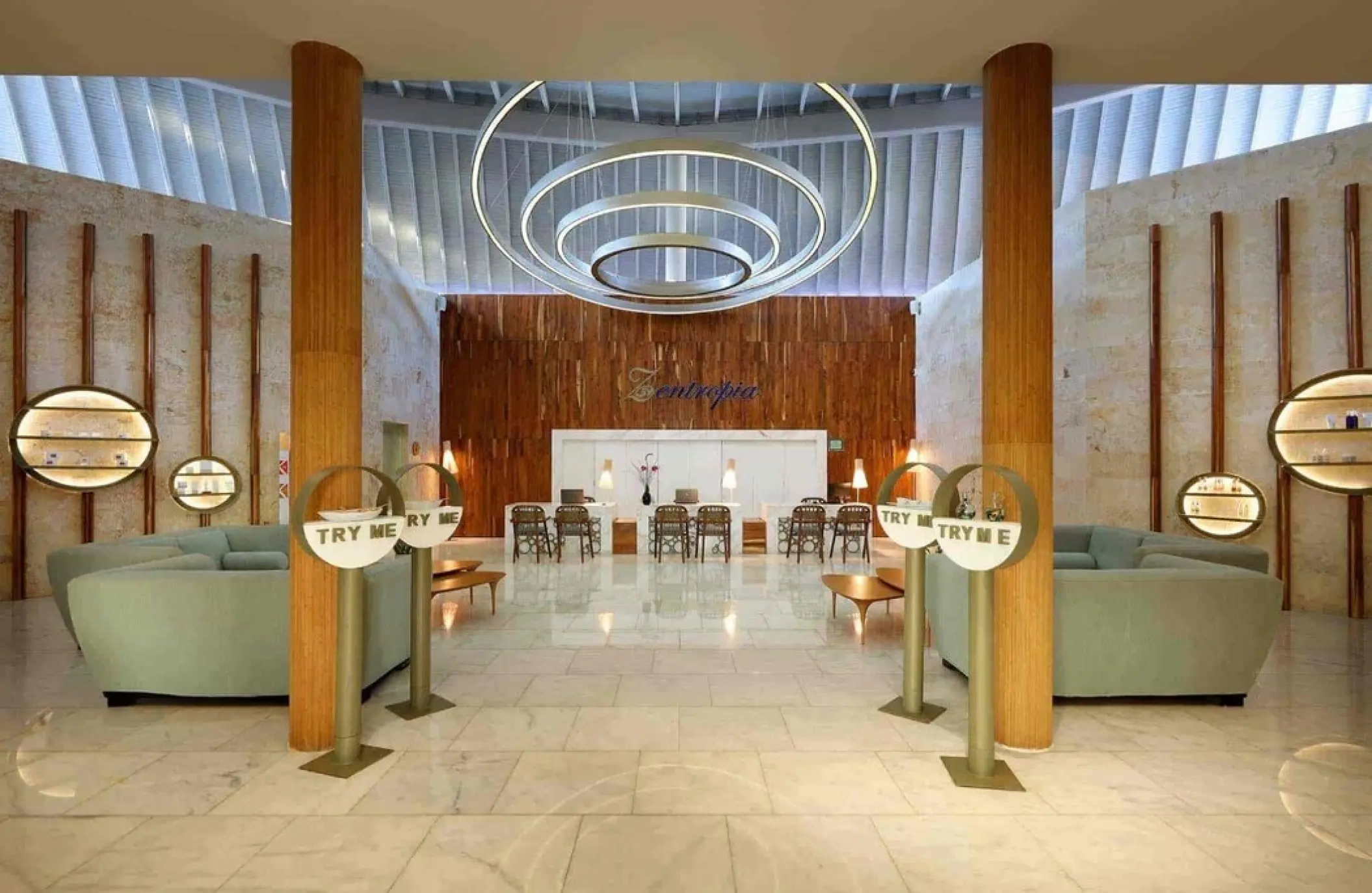 TRS Turquesa spa reception lobby with modern circular lighting, Punta Cana