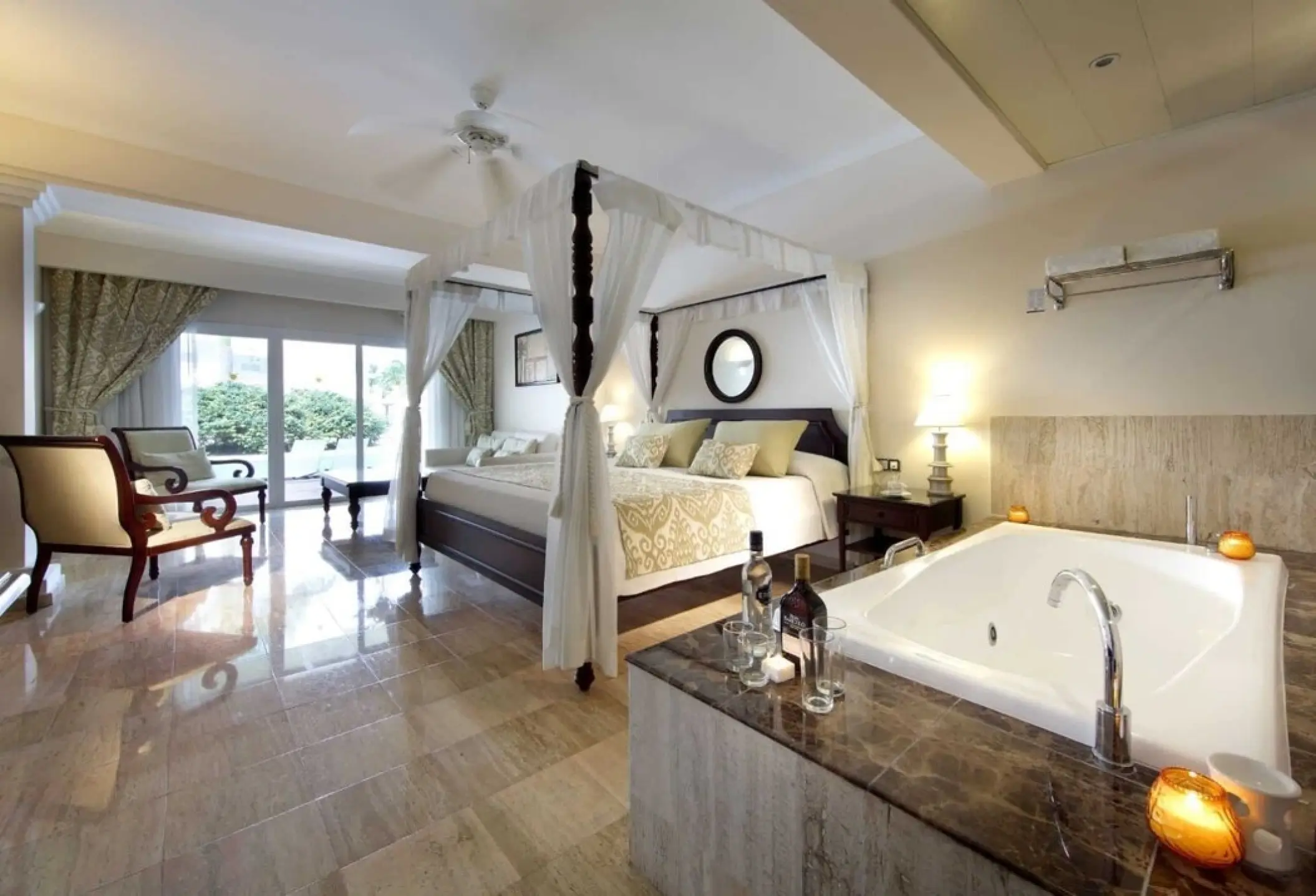 TRS Turquesa suite featuring a canopy bed, tile floors and an in-room hot tub, Punta Cana