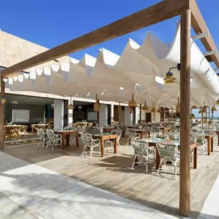 Helios Terrace wedding reception venue with white canopy at TRS Yucatan, Riviera Maya