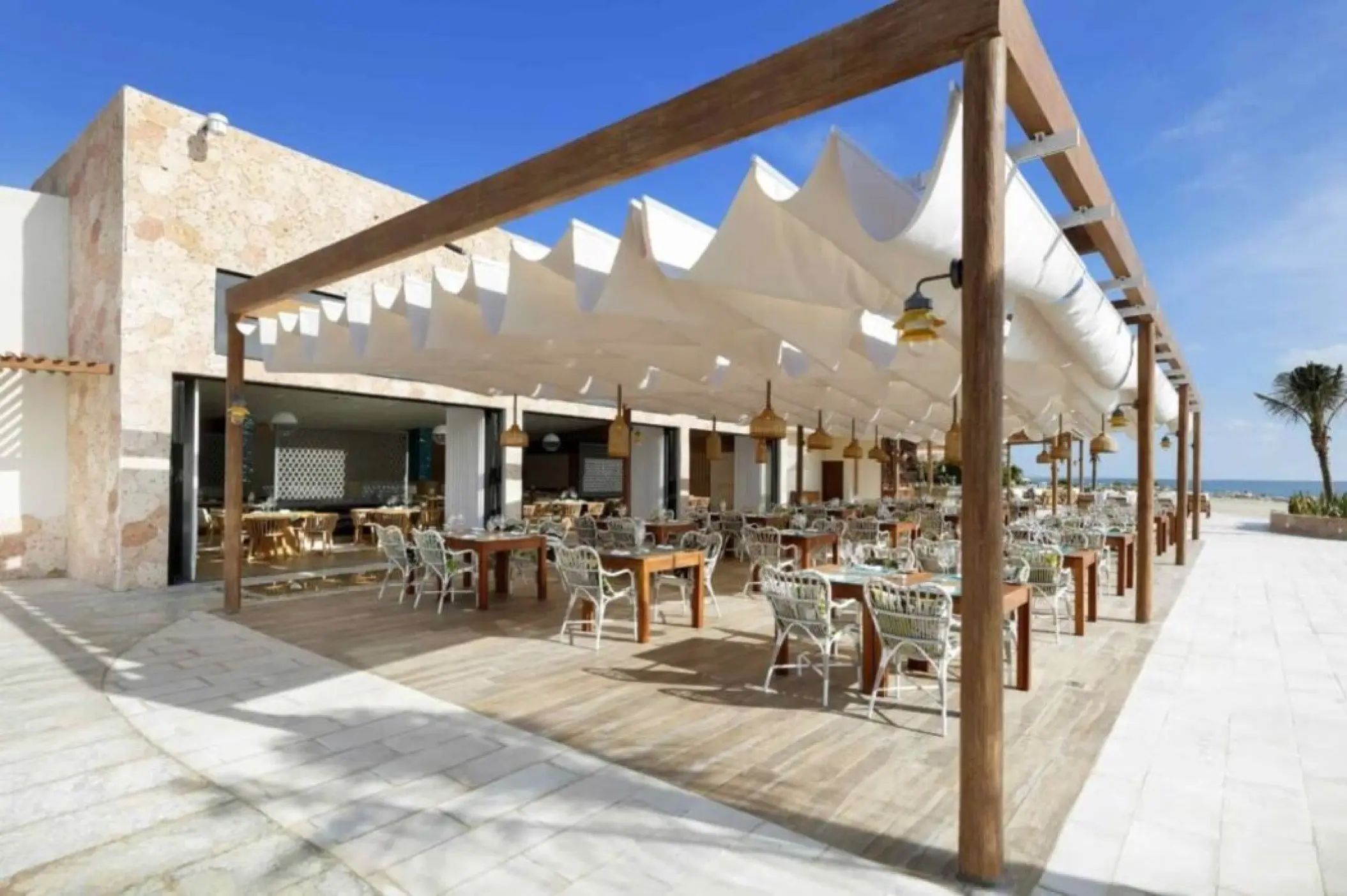 Helios Terrace wedding reception venue with white canopy at TRS Yucatan, Riviera Maya