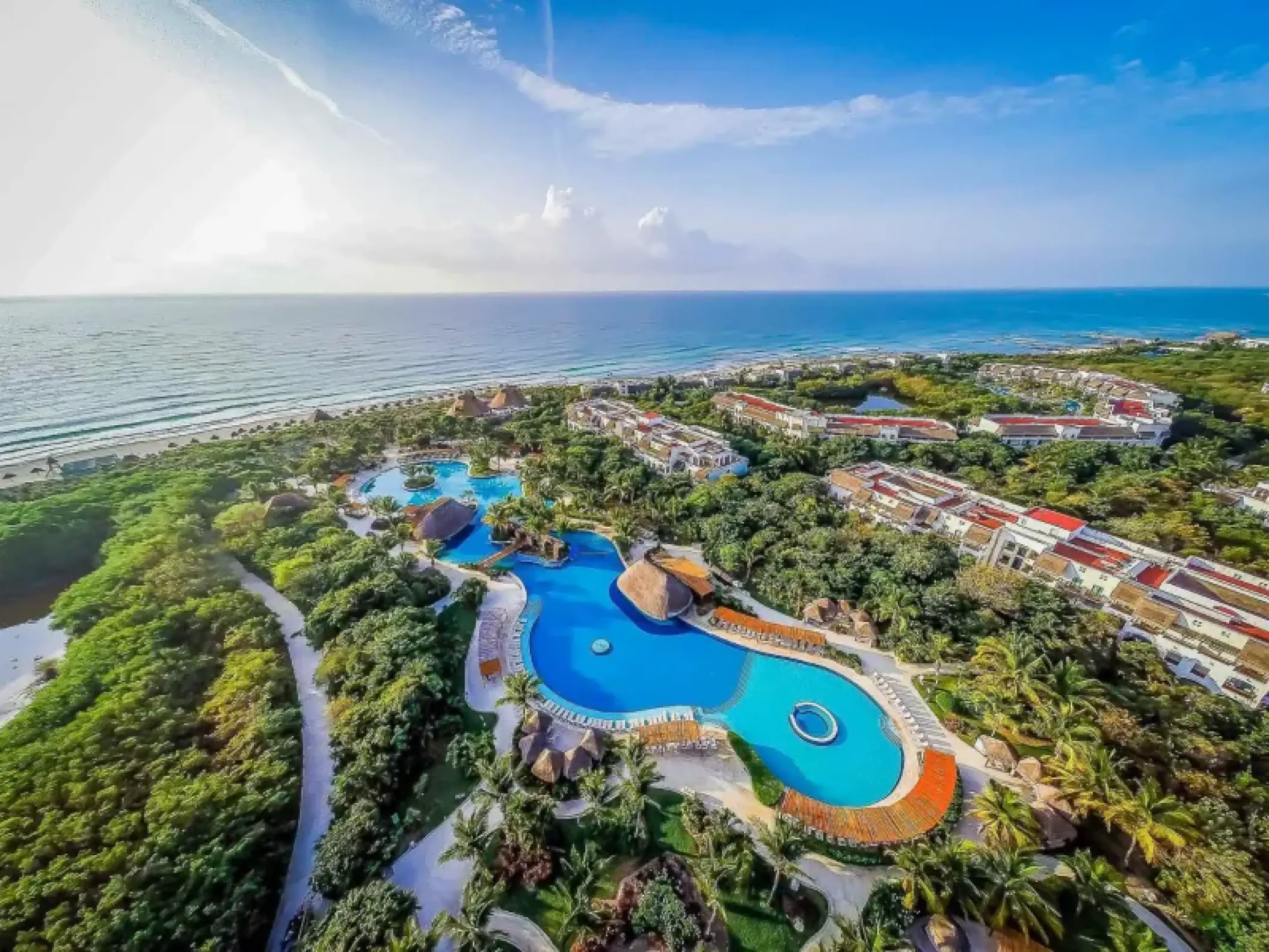 Valentin Imperial Riviera Maya aerial view of beachfront pools and resort grounds, Riviera Maya