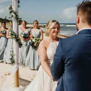Beachfront wedding ceremony for a couple at Valentin Imperial, Riviera Maya