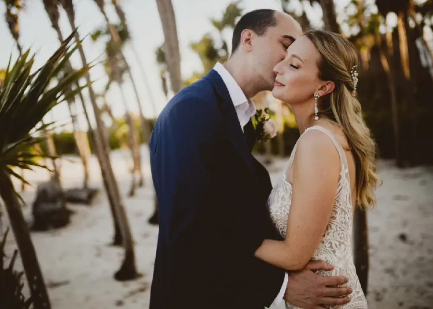 Couple on the beach at Valentin Imperial Maya resort