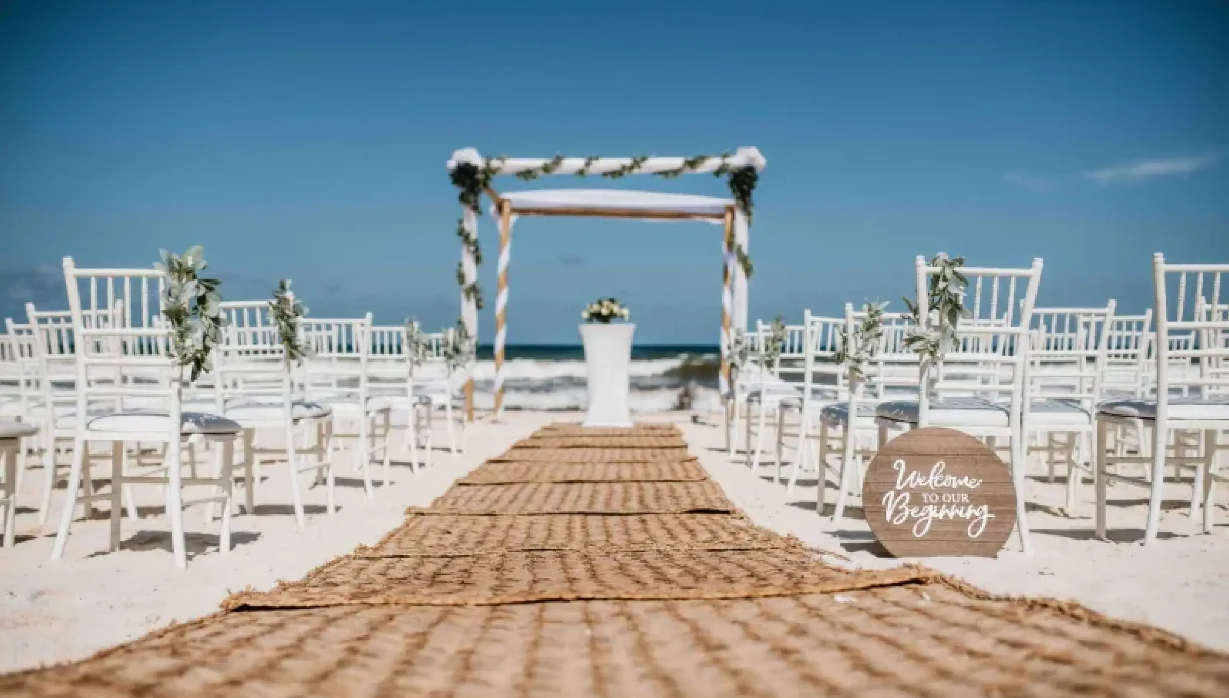 Beach ceremony decor at Valentin Imperial Maya resort