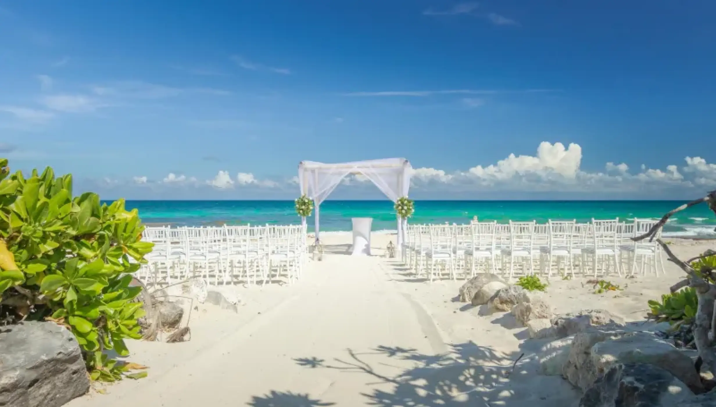 Beach ceremony decor at Valentin Imperial Riviera Maya
