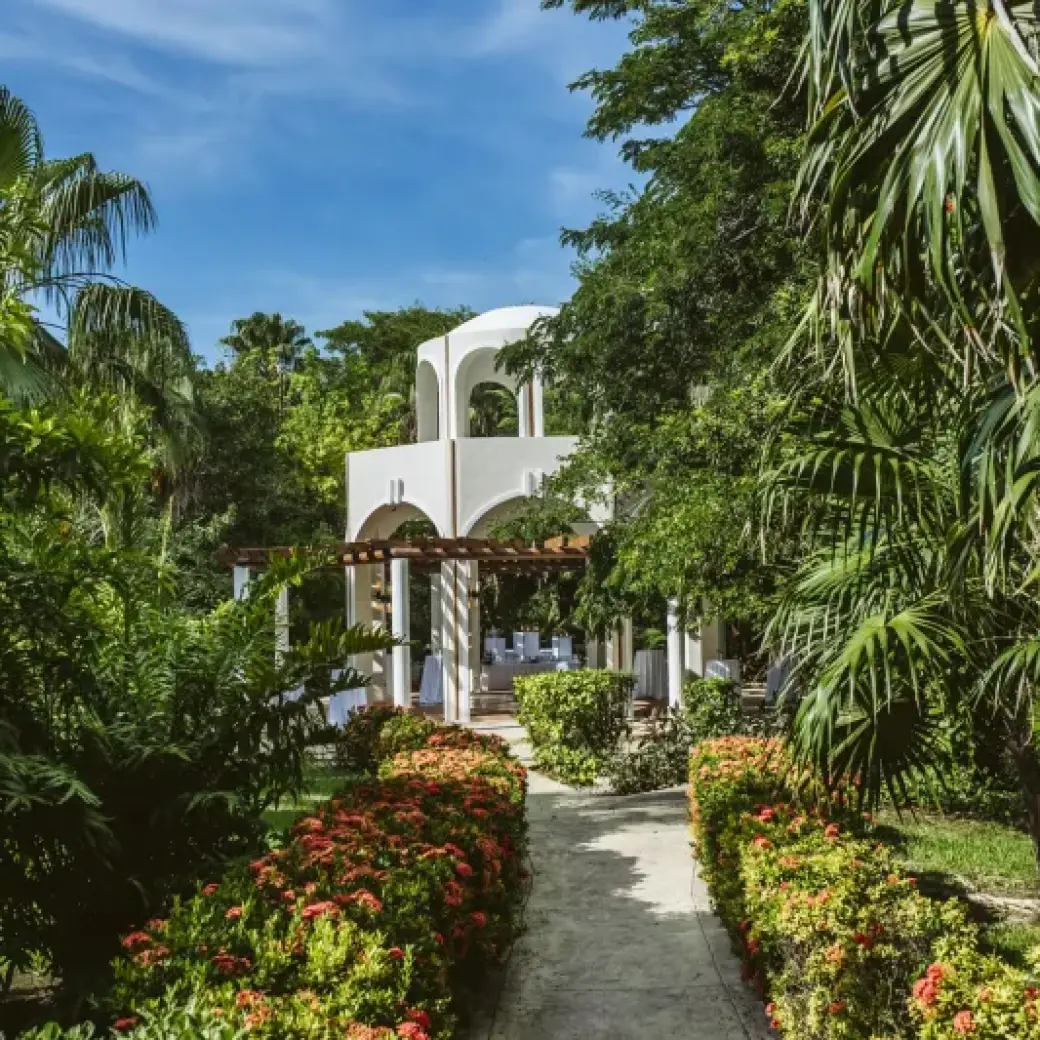 White wedding gazebo ceremony setup at Valentin Imperial, Riviera Maya