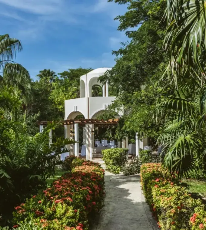 White wedding gazebo ceremony setup at Valentin Imperial, Riviera Maya
