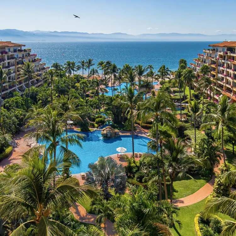 Aerial view of Velas Vallarta pools and tropical grounds overlooking the ocean, Puerto Vallarta