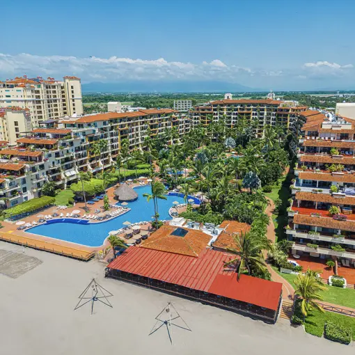 Aerial view of Velas Vallarta buildings, swimming pool, and tropical grounds, Puerto Vallarta