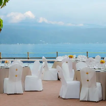 Pool terrace wedding reception setup at Velas Vallarta, Puerto Vallarta