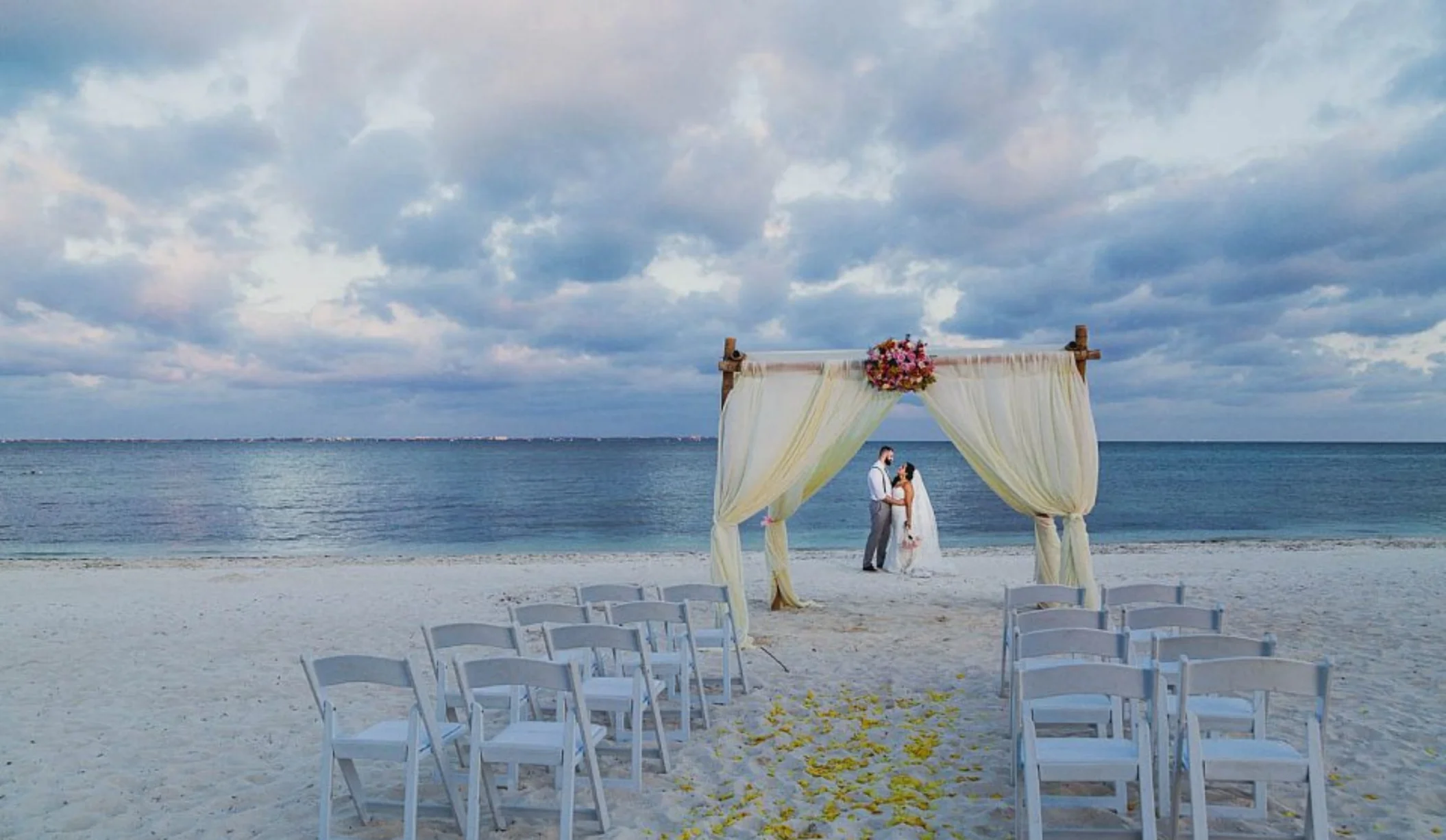 bride and groom on the beach at Villa del Palmar Cancun