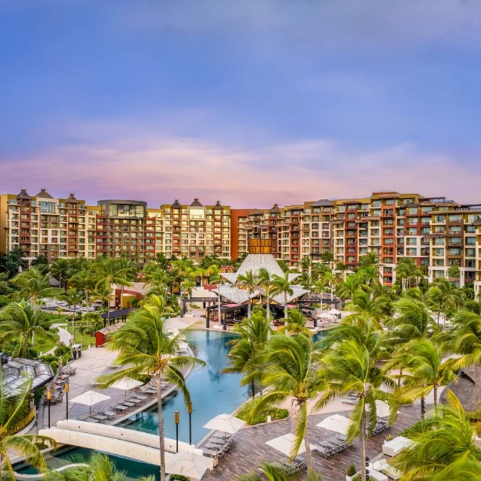 Villa del Palmar Cancun resort with its buildings and pools and palm trees