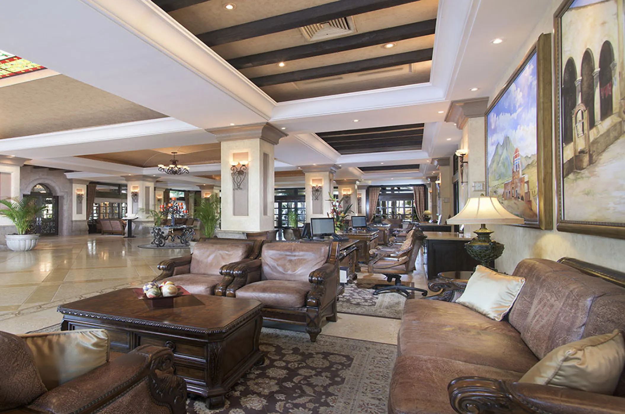 Lobby lounge with leather seating and beamed ceilings at Villa La Estancia Riviera Nayarit, Puerto Vallarta