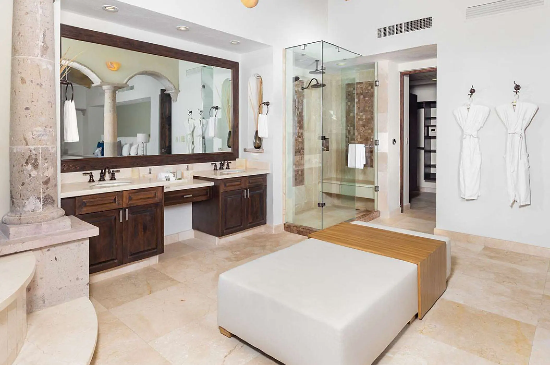 Luxury penthouse bathroom with double vanity and glass shower at Villa La Estancia Riviera Nayarit, Puerto Vallarta