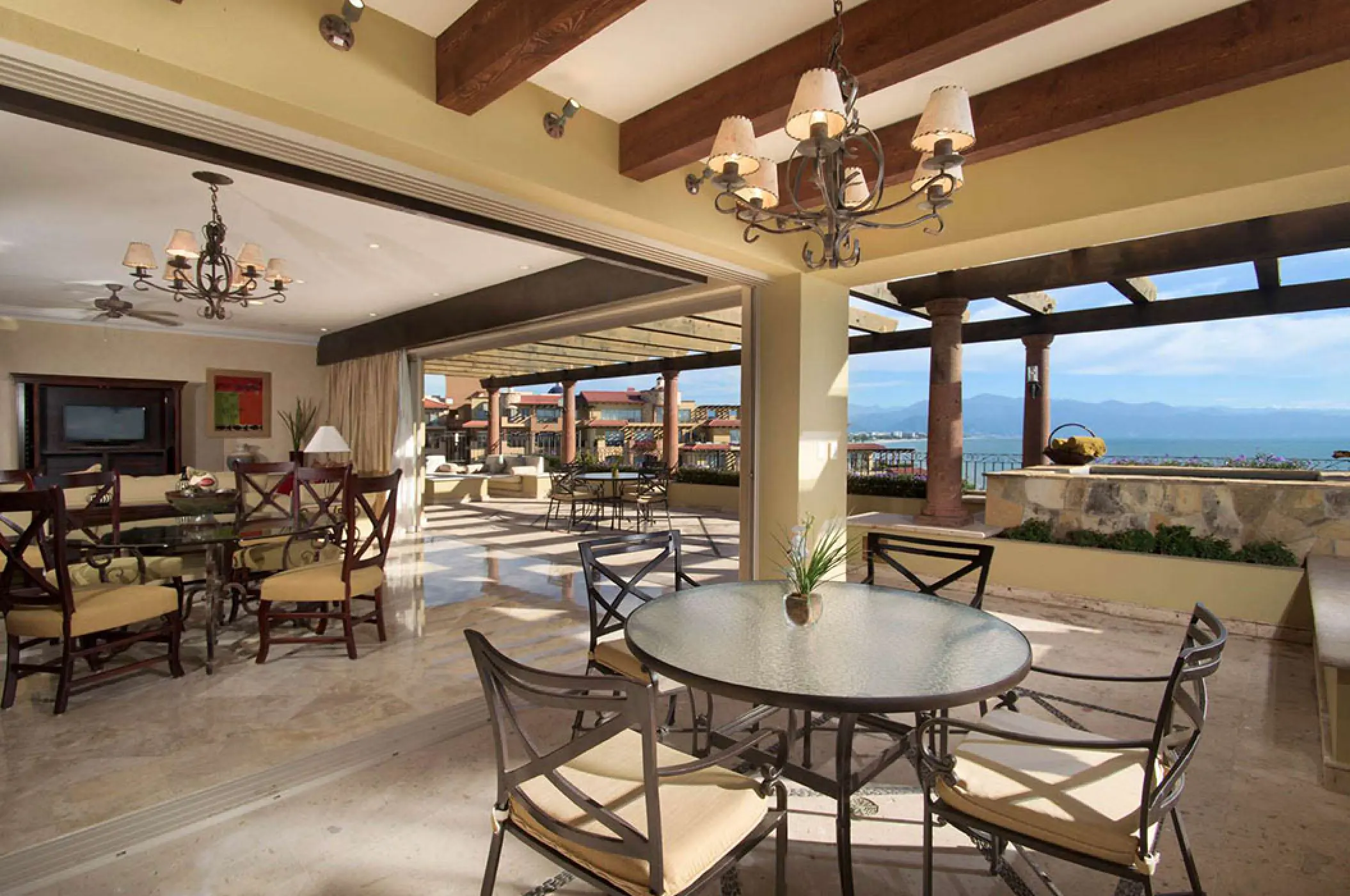 Three-bedroom suite terrace with dining area and ocean views at Villa La Estancia Riviera Nayarit, Puerto Vallarta