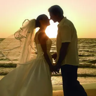 Silhouette of a couple holding hands at sunset at Villa La Estancia Riviera Nayarit, Puerto Vallarta