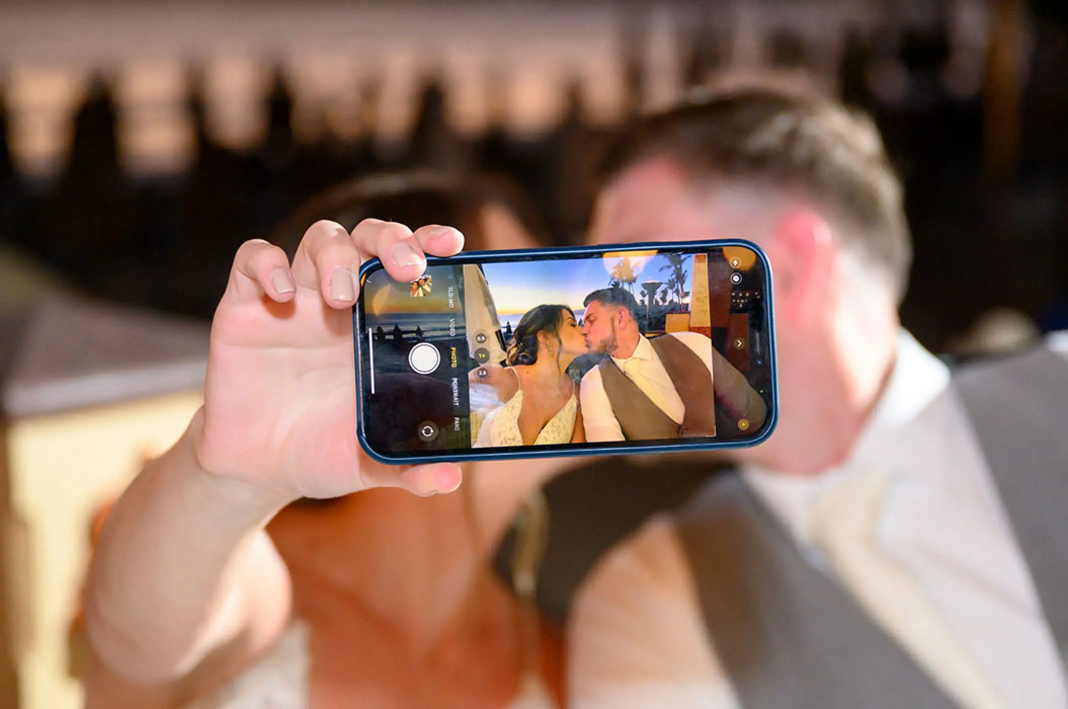 Close-up of a bride and groom taking a selfie while kissing at Villa La Estancia Riviera Nayarit, Puerto Vallarta