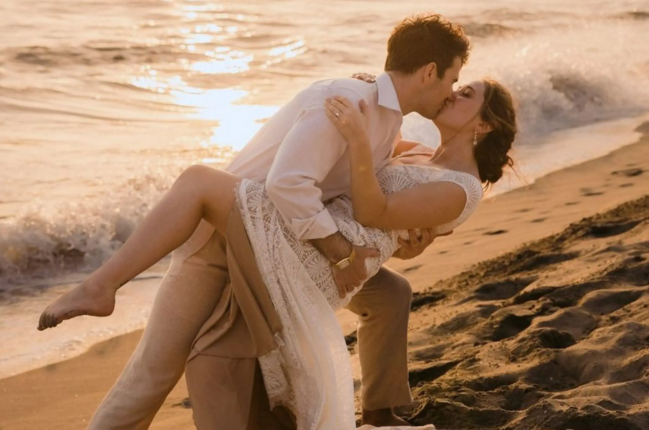 Groom dipping and kissing the bride on the beach at Villa La Estancia Riviera Nayarit, Puerto Vallarta