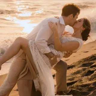 Groom dipping and kissing the bride on the beach at Villa La Estancia Riviera Nayarit, Puerto Vallarta