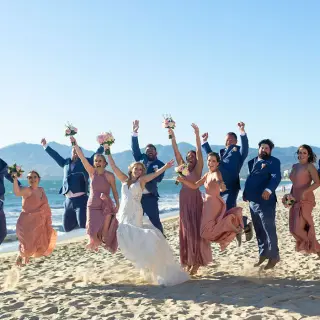 Wedding party jumping on the beach at Villa La Estancia Riviera Nayarit, Puerto Vallarta