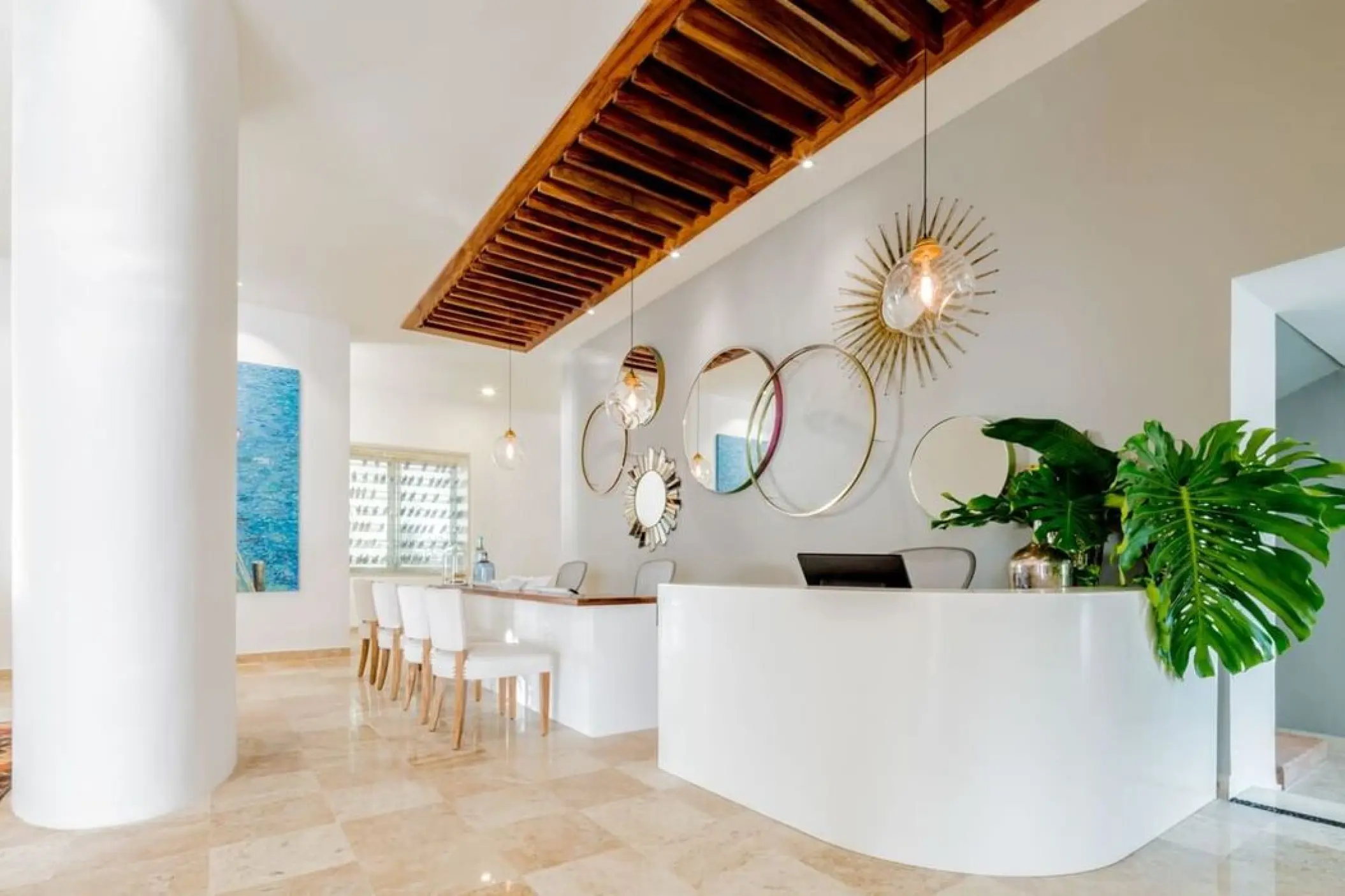 Concierge desk and lobby area with modern decor at Villa Premiere Boutique Hotel, Puerto Vallarta