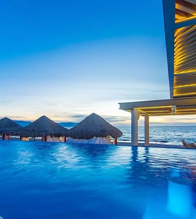 Villa Premiere Boutique Hotel infinity pool overlooking the ocean at sunset, Puerto Vallarta