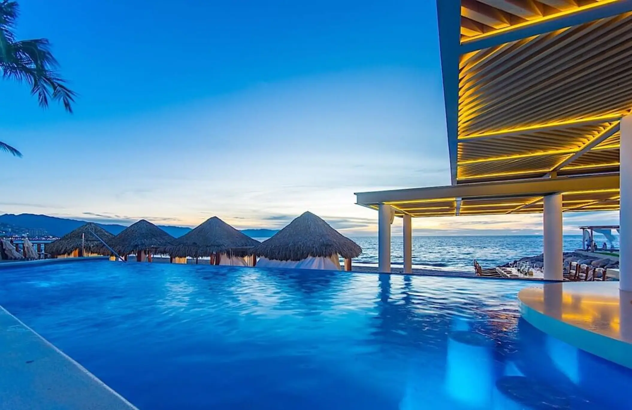 Villa Premiere Boutique Hotel infinity pool overlooking the ocean at sunset, Puerto Vallarta