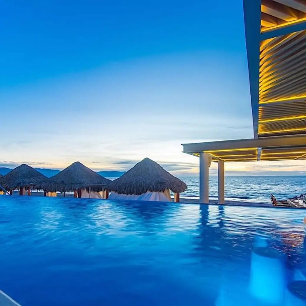 Villa Premiere Boutique Hotel infinity pool overlooking the ocean at sunset, Puerto Vallarta