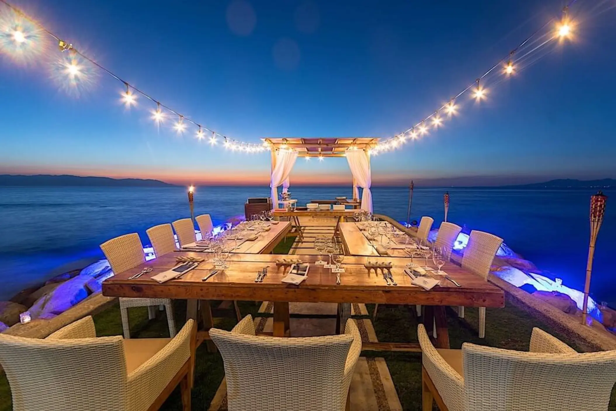 Jetty wedding reception with string lights at Villa Premiere Boutique Hotel, Puerto Vallarta