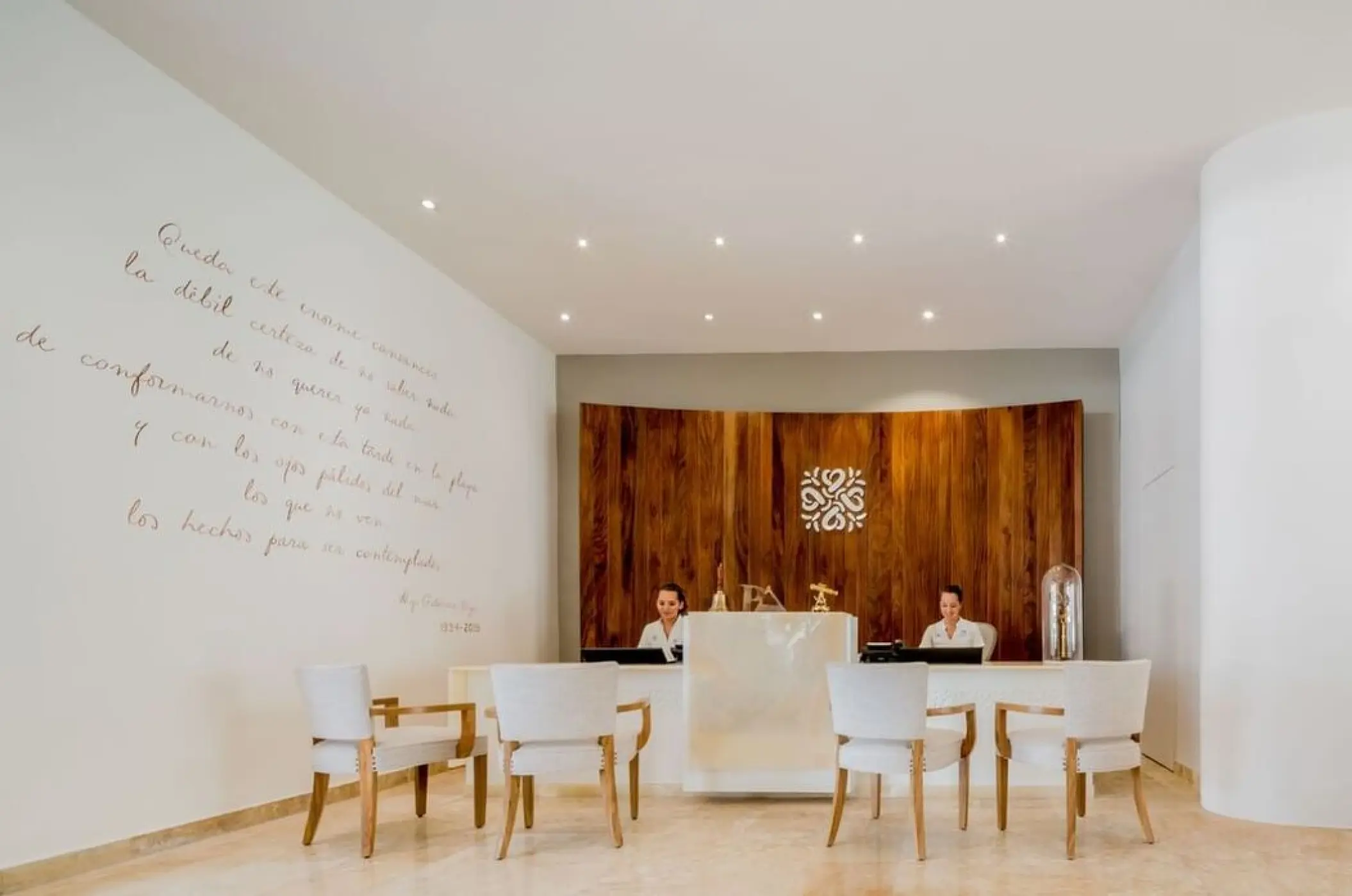 Reception desk and lobby seating at Villa Premiere Boutique Hotel, Puerto Vallarta