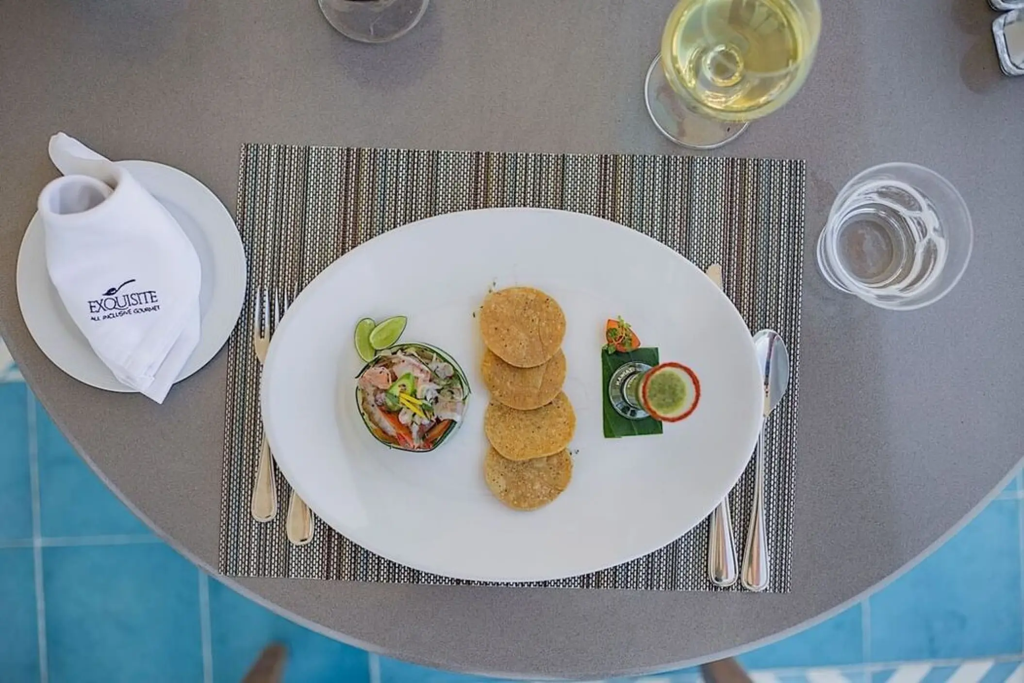 Plated aguachile with tostadas at Villa Premiere Boutique Hotel, Puerto Vallarta