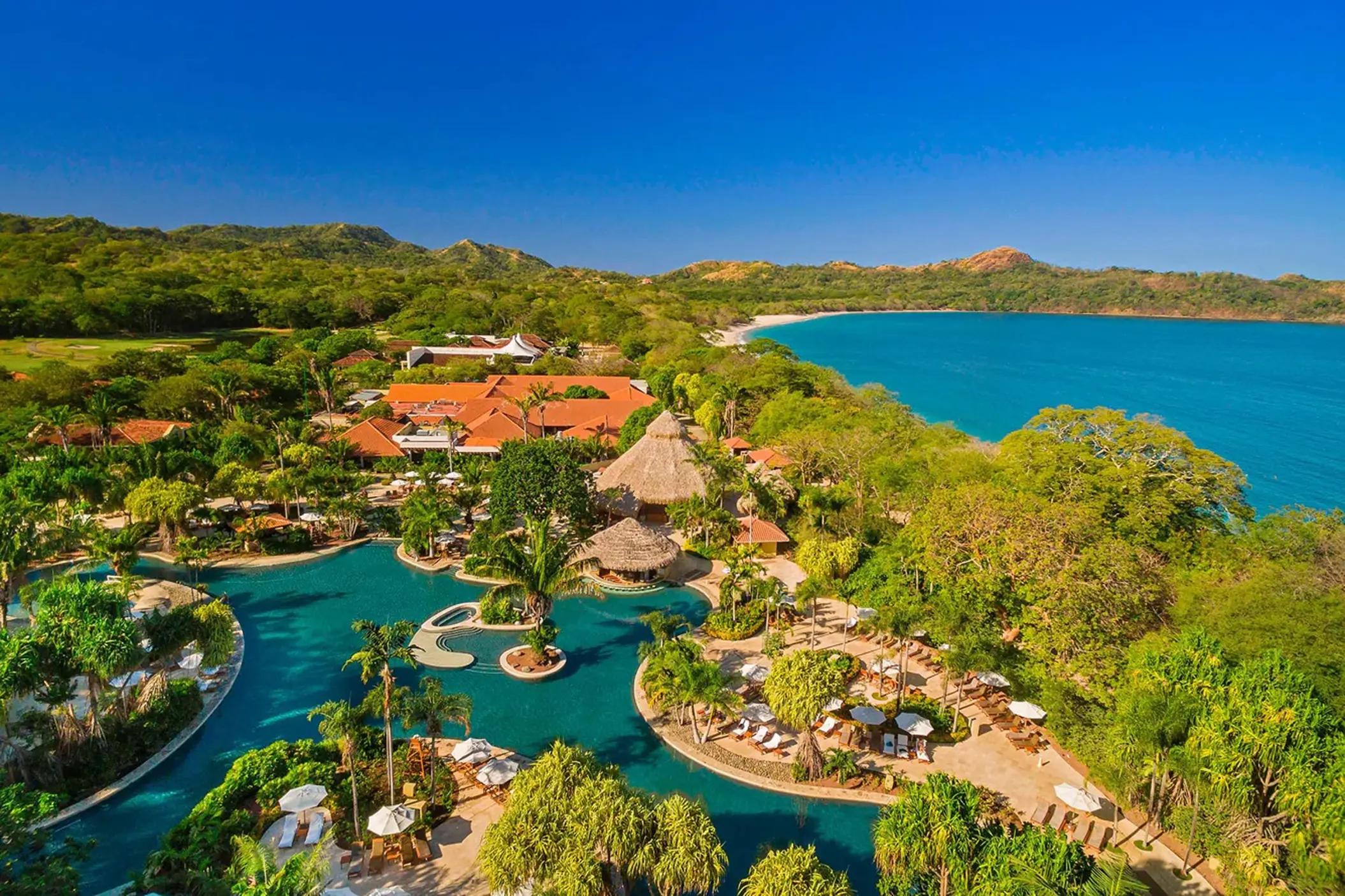 Aerial view of the lagoon-style pool and beachfront at Westin Reserva Conchal, Liberia